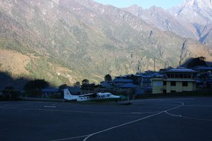 A plane arriving up Lukla's steep runway